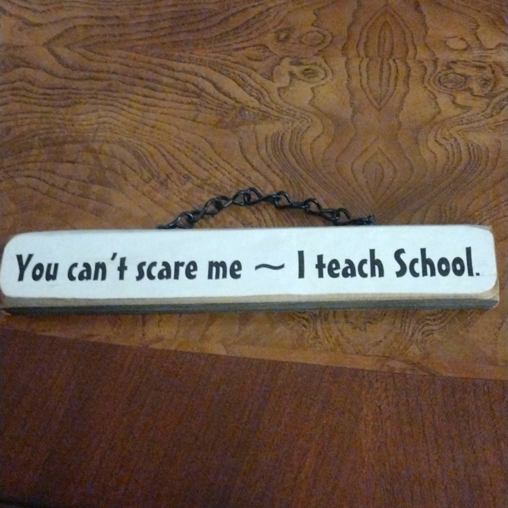 Hanging wooden sign